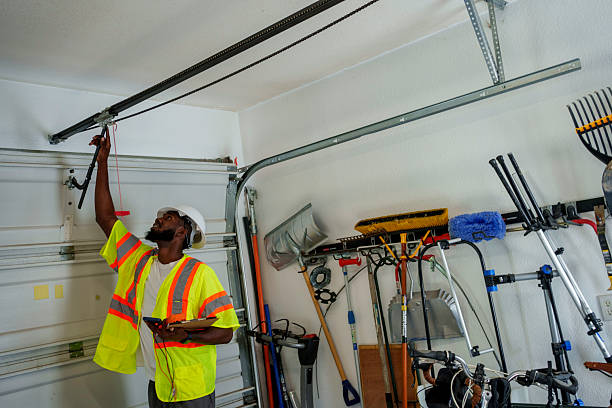 Professional Garage Door Panel Replacement technician working in Southside Place, TX